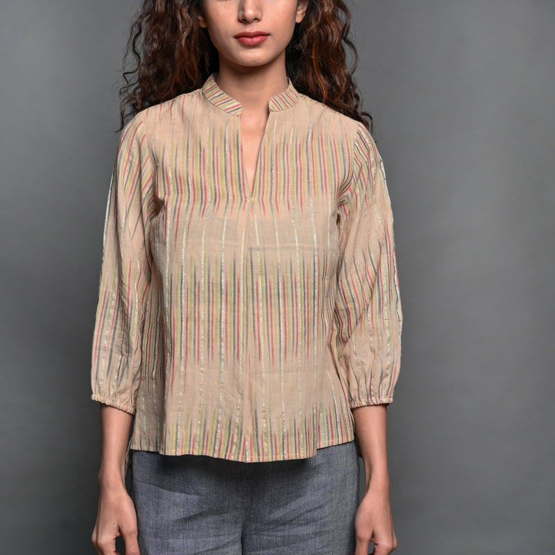 Front Detail of a Model wearing Beige Striped Handwoven Cotton Split Neck Pleated Shirt