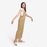 Right View of a Model wearing Beige Waist Tie Up Pinafore Jumpsuit