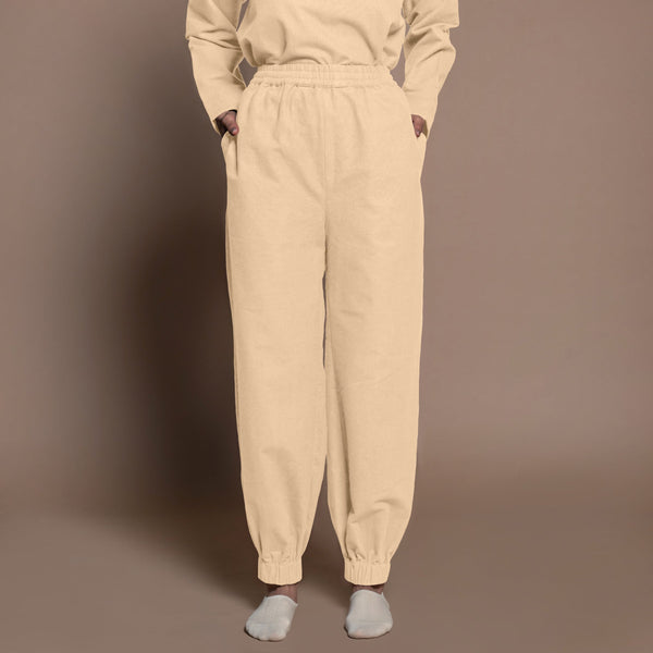 Front View of a Model wearing Beige Warm Cotton Flannel Elasticated High-Rise Jogger Pant