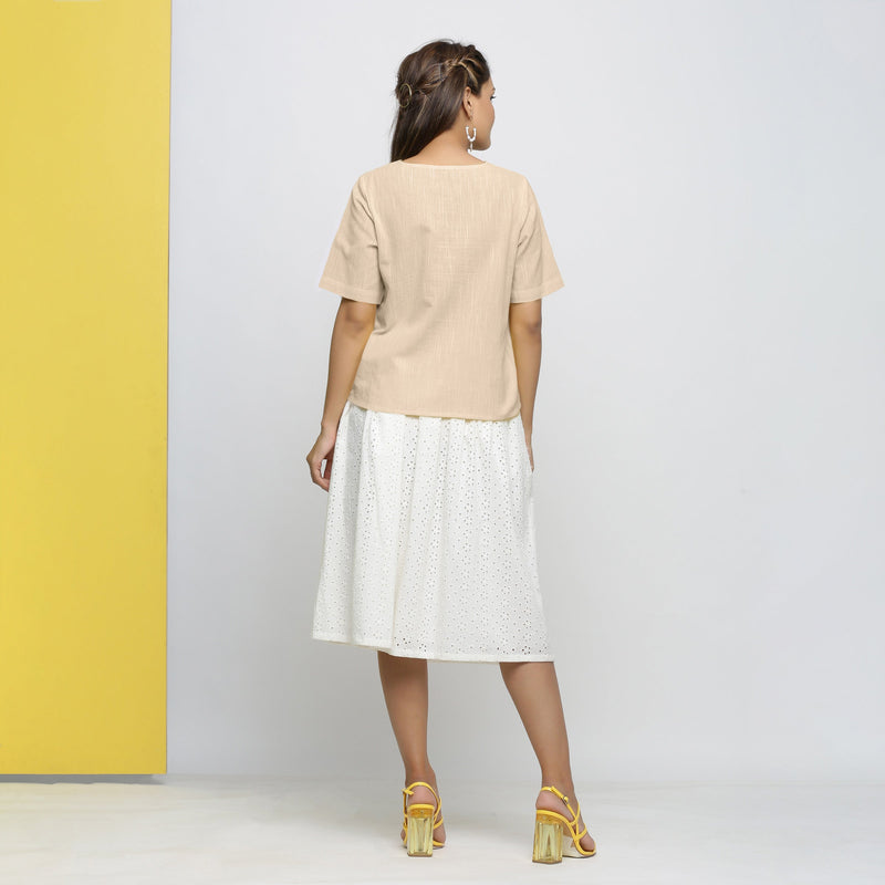 Back View of a Model wearing Beige Yarn Dyed 100% Cotton V-Neck High-Low Top