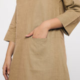 Front Detail of a Model wearing Beige Yoked Cotton Tunic Dress