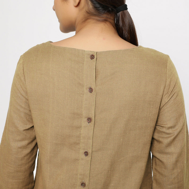 Back Detail of a Model wearing Beige Yoked Cotton Tunic Dress