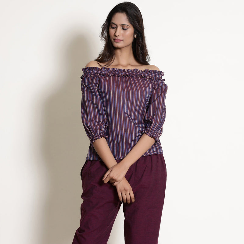 Front View of a Model wearing Berry Wine Striped Off-Shoulder Frilled Top