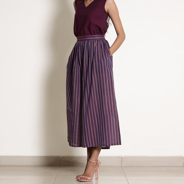 Left View of a Model wearing Berry Wine Striped Gathered Culottes