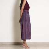 Right View of a Model wearing Berry Wine Striped Gathered Culottes