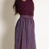 Left Detail View of a Model wearing Berry Wine Striped Gathered Culottes