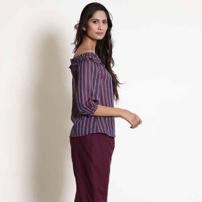 Right View of a Model wearing Berry Wine Striped Cotton Off-Shoulder Frilled Top
