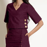 Front Detail of a Model wearing Berry Wine Warm V-Neck Wrap Top