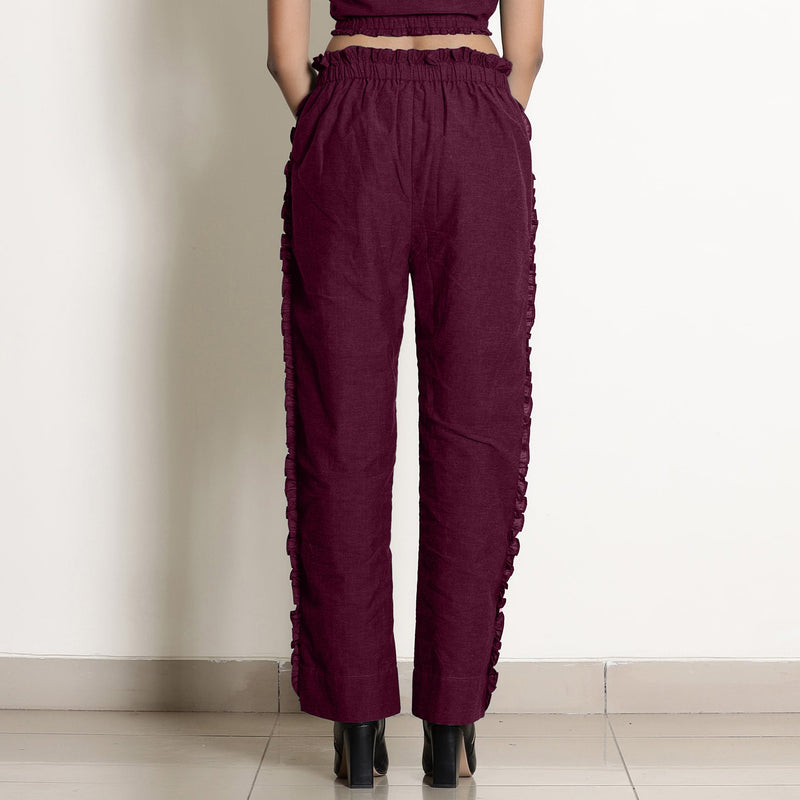 Back View of a Model wearing Warm Berrry Wine Frilled Straight Pant