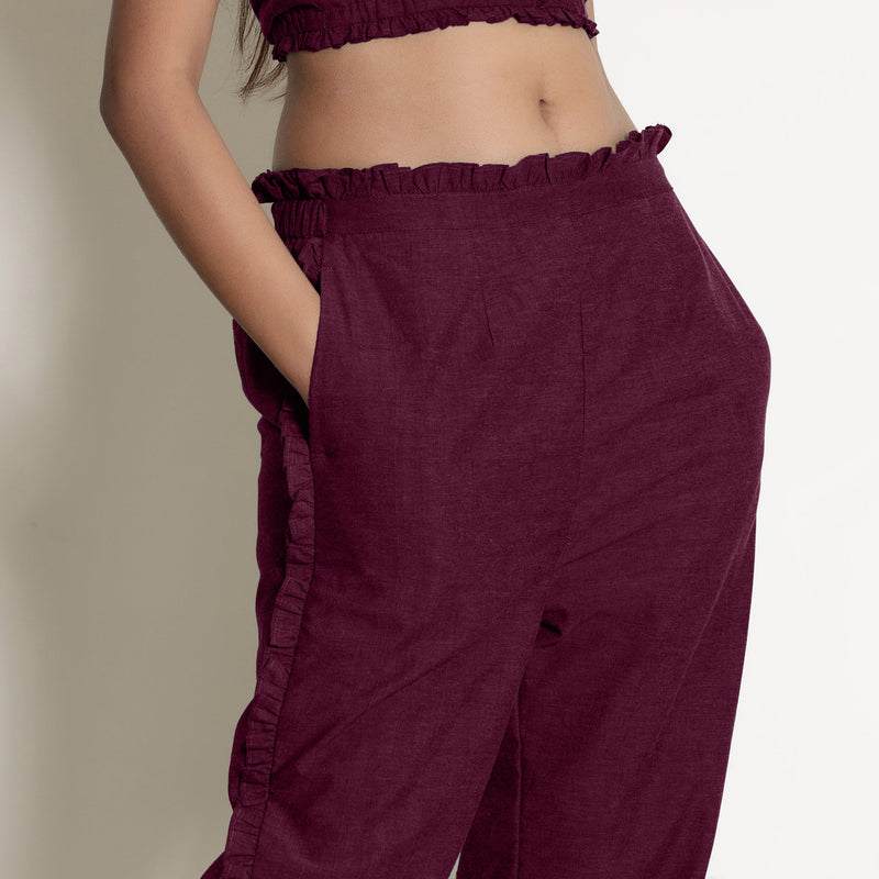 Front Detail of a Model wearing Warm Berrry Wine Frilled Straight Pant