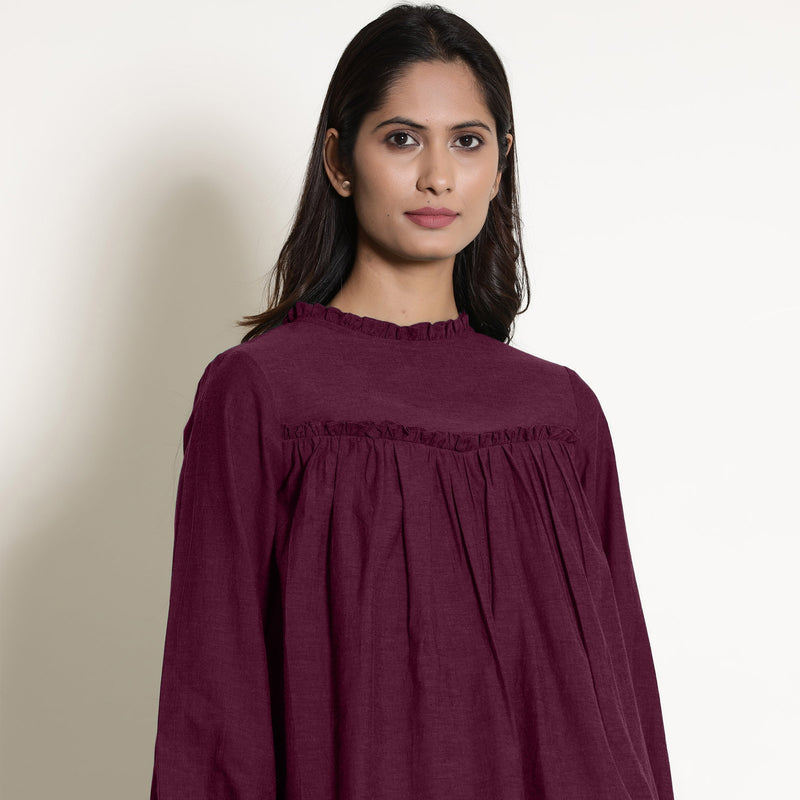 Front Detail of a Model wearing Warm Berry Wine Frilled Gathered Yoked Top