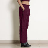 Right View of a Model wearing Warm Berrry Wine Frilled Straight Pant