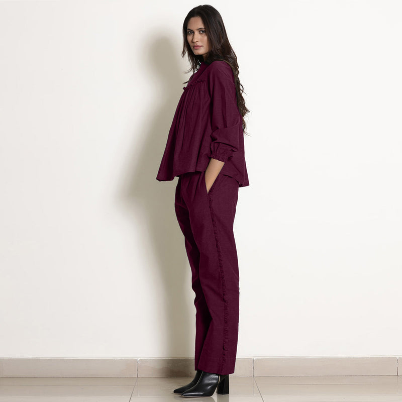 Left View of a Model wearing Berry Wine Warm Frilled Cotton Top and Frilled Paperbag Pant Co-ord Set