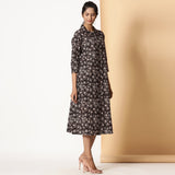 Right View of a Model wearing Black Bagru Block Printed Button-Down Dress
