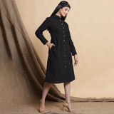 Right View of a Model wearing Black Button Down Cotton Flax Knee Length Formal Dress