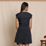 Back View of a Model wearing Black Cap Sleeve Cotton Flannel Short Top