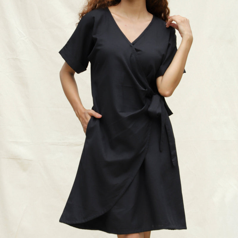 Front Detail of a Model wearing Black Cotton Flax A-Line Knee Length Wrap Dress