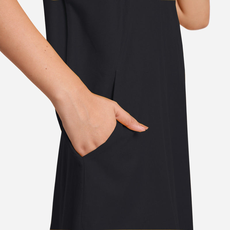 Front Detail of a Model wearing Black Cotton Flax Anti-Fit Dress