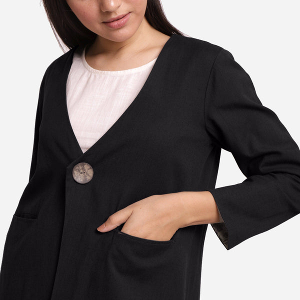 Front Detail of a Model wearing Black Cotton Flax Mid-Calf Length A-Line Jacket