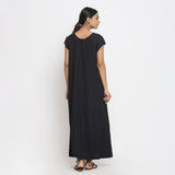 Back View of a Model wearing Black Cotton Flax A-Line Paneled Dress