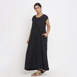 Left View of a Model wearing Black Cotton Flax A-Line Paneled Dress