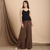 Front View of a Model wearing Black Cotton Flax Slim Fit Pleated Camisole Top