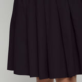 Front Detail of a Model wearing Black Cotton Flax Pleated Skirt
