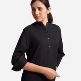 Front Detail of a Model wearing Black Cotton Flax Shirt Dress