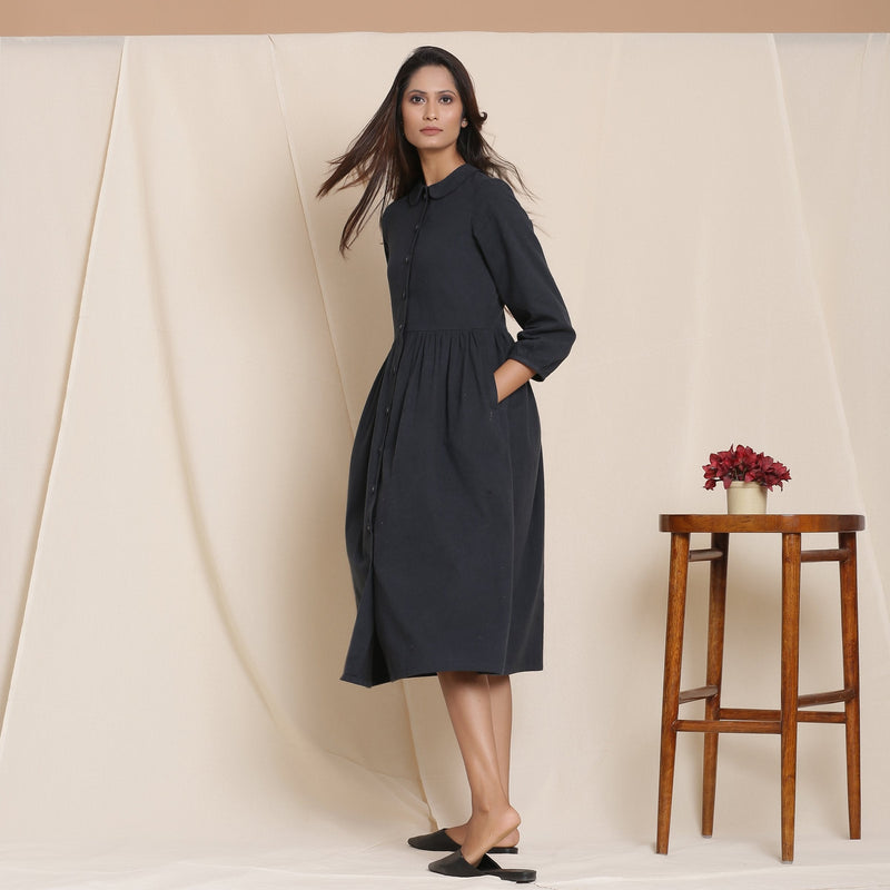 Left View of a Model wearing Black Warm Cotton Flannel Peter Pan Midi Dress