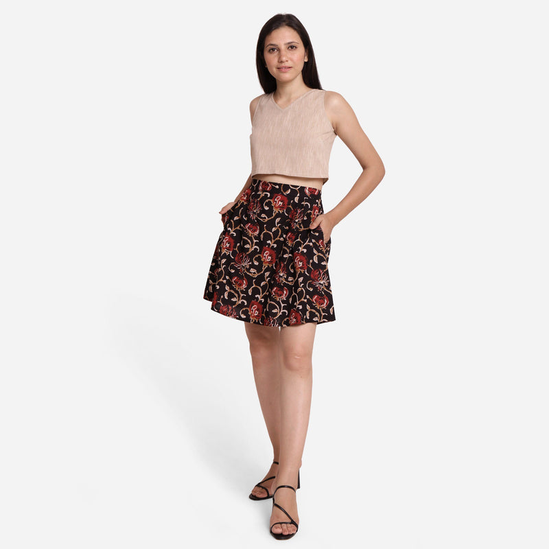 Front View of a Model wearing Black Floral A-Line Cotton Flared Skirt