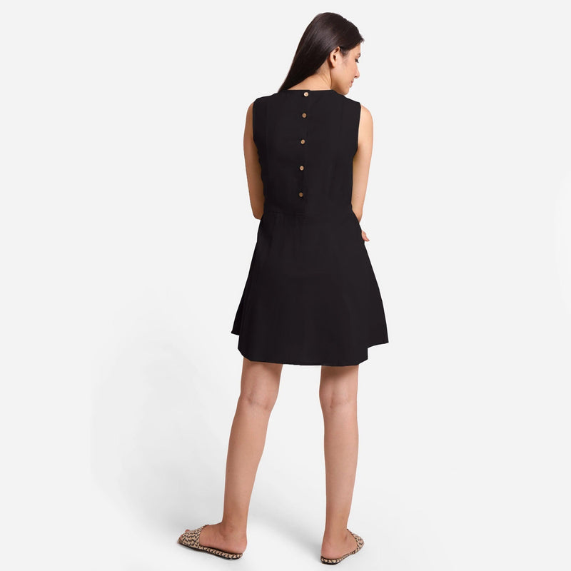 Back View of a Model wearing Black Patch Pocket Round Neck Dress
