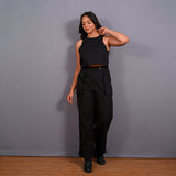 Front View of a Model wearing Black Warm Cotton Flannel Cropped Tank Top