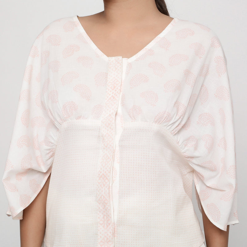Front Detail of a Model wearing Pink Paisley Block Print Cotton V-Neck Blouse
