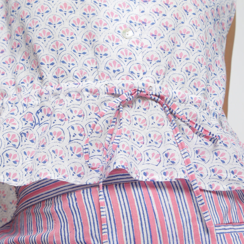 Close View of a Model wearing Block Printed Button-Down Peplum Top