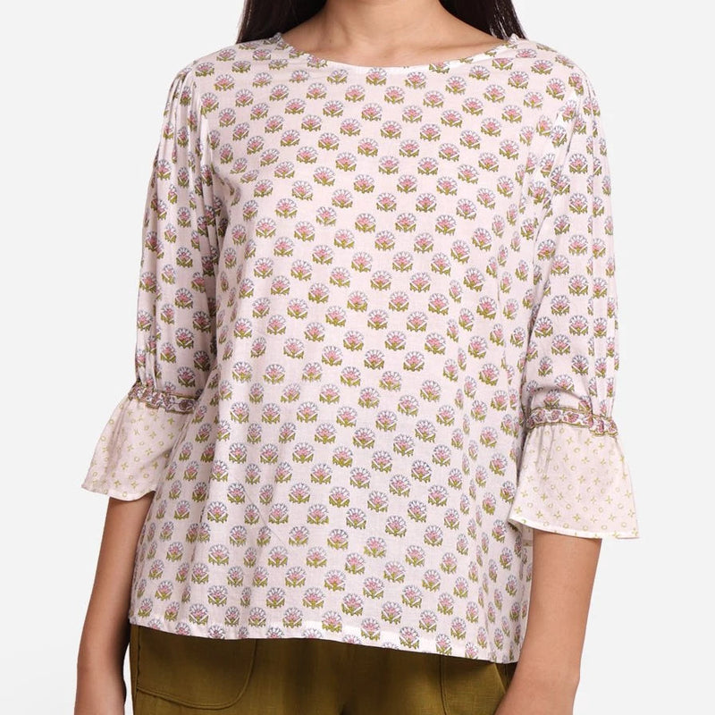 Front Detail of a Model wearing White Block Printed Cotton Frilled Puff Sleeves Top