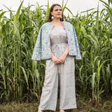 Front View of a Model wearing Block Printed Jumpsuit and Quilted Jacket Set