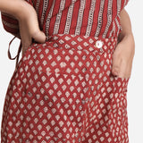 Front Detail of a Model wearing Brick Red Block Printed Cotton Ankle Length Pant