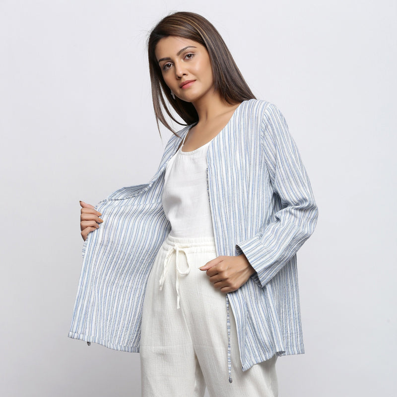 Left View of a Model wearing Blue and White Striped V-Neck Shrug