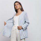 Front View of a Model wearing Blue and White Striped V-Neck Shrug