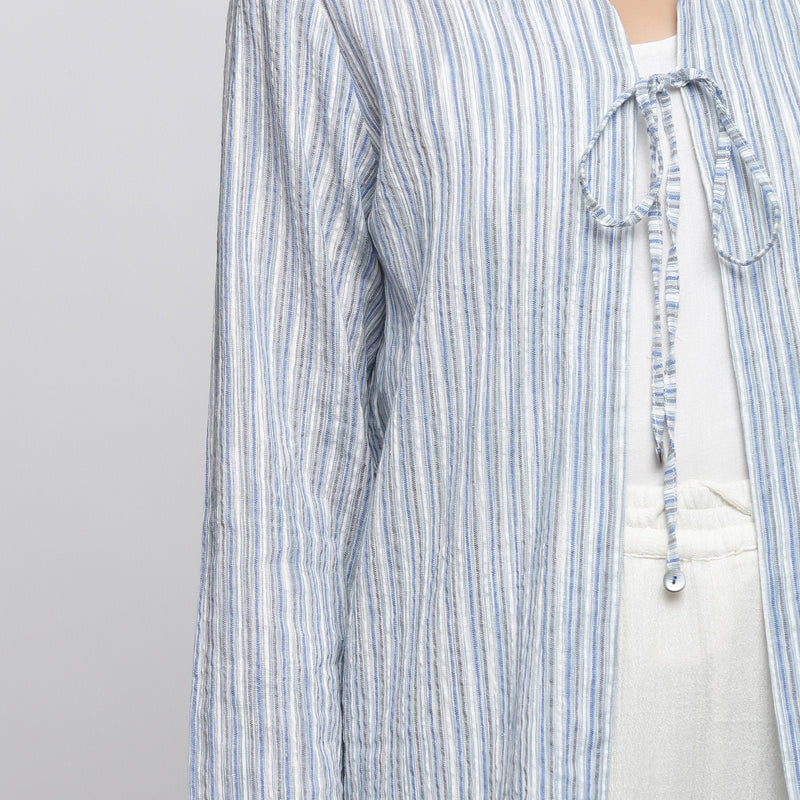 Front Detail of a Model wearing Blue and White Striped V-Neck Shrug