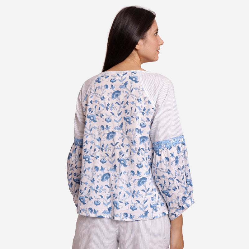 Back View of a Model wearing Blue Floral Block Printed Peasant Cotton Top