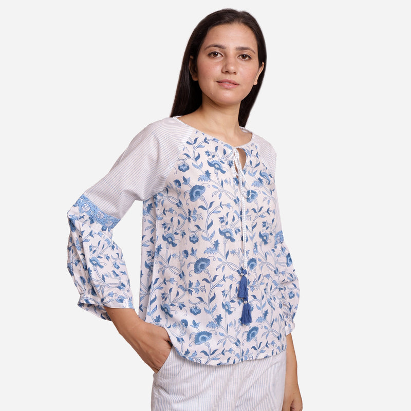 Right View of a Model wearing Blue Floral Block Printed Peasant Cotton Top