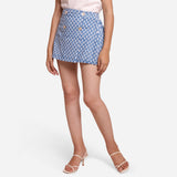 Front View of a Model wearing Blue Block Printed Button-Down Skirt