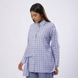 Left View of a Model wearing Blue Checkered Handspun 100% Cotton Button-Down Shirt