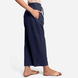 Right View of a Model wearing Blue Cotton Flax Wide Legged Pant