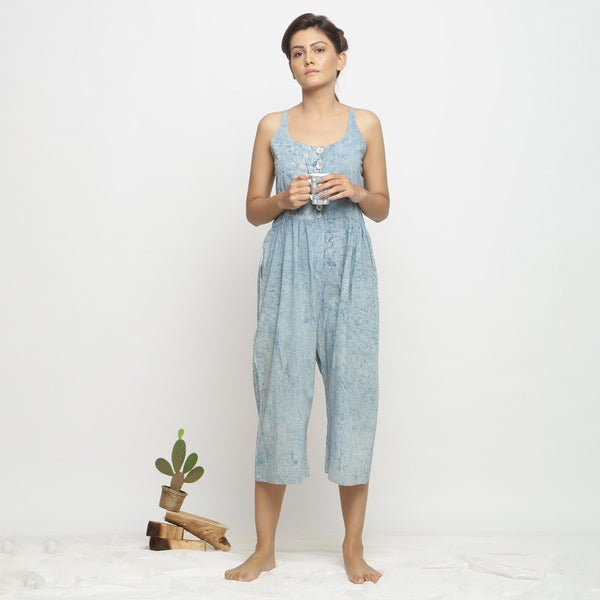 Front View of a Model wearing Blue Dabu Printed Button-Down Jumpsuit
