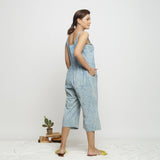 Back View of a Model wearing Blue Dabu Printed Button-Down Jumpsuit