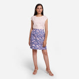 Front View of a Model wearing Blue Button-Down A-Line Floral Skirt