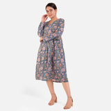 Front View of a Model wearing Blue Block Print Floral Cotton Knee Length Dress