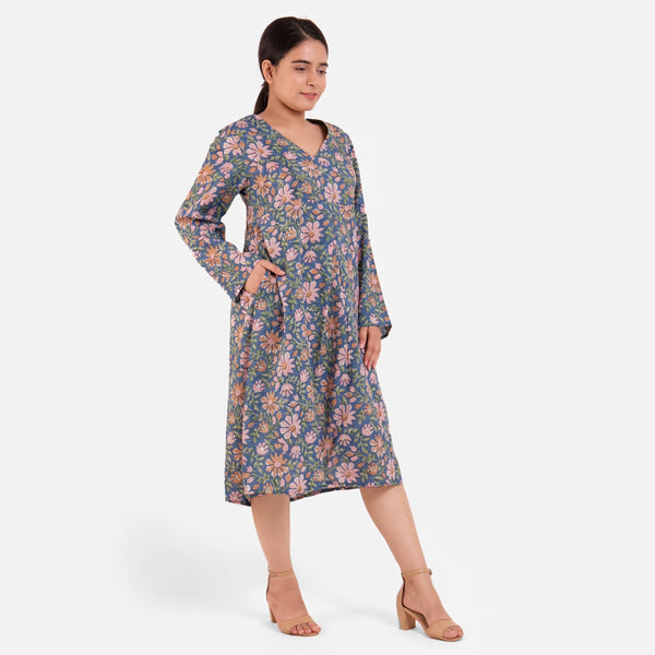 Right View of a Model wearing Blue Block Print Floral Cotton Knee Length Dress